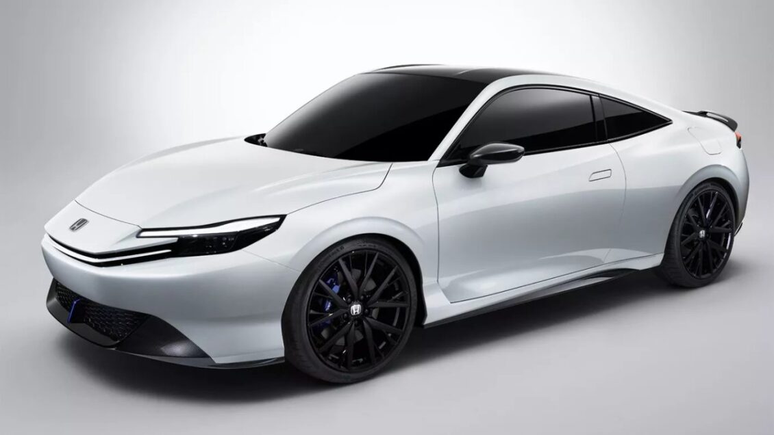 a white sports car with black rims