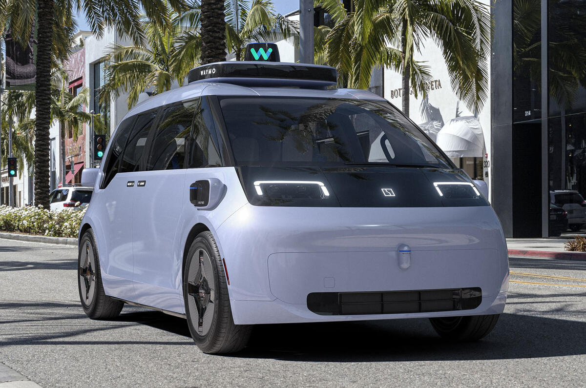 Waymo zeekr minivan 2022 front quarter tracking