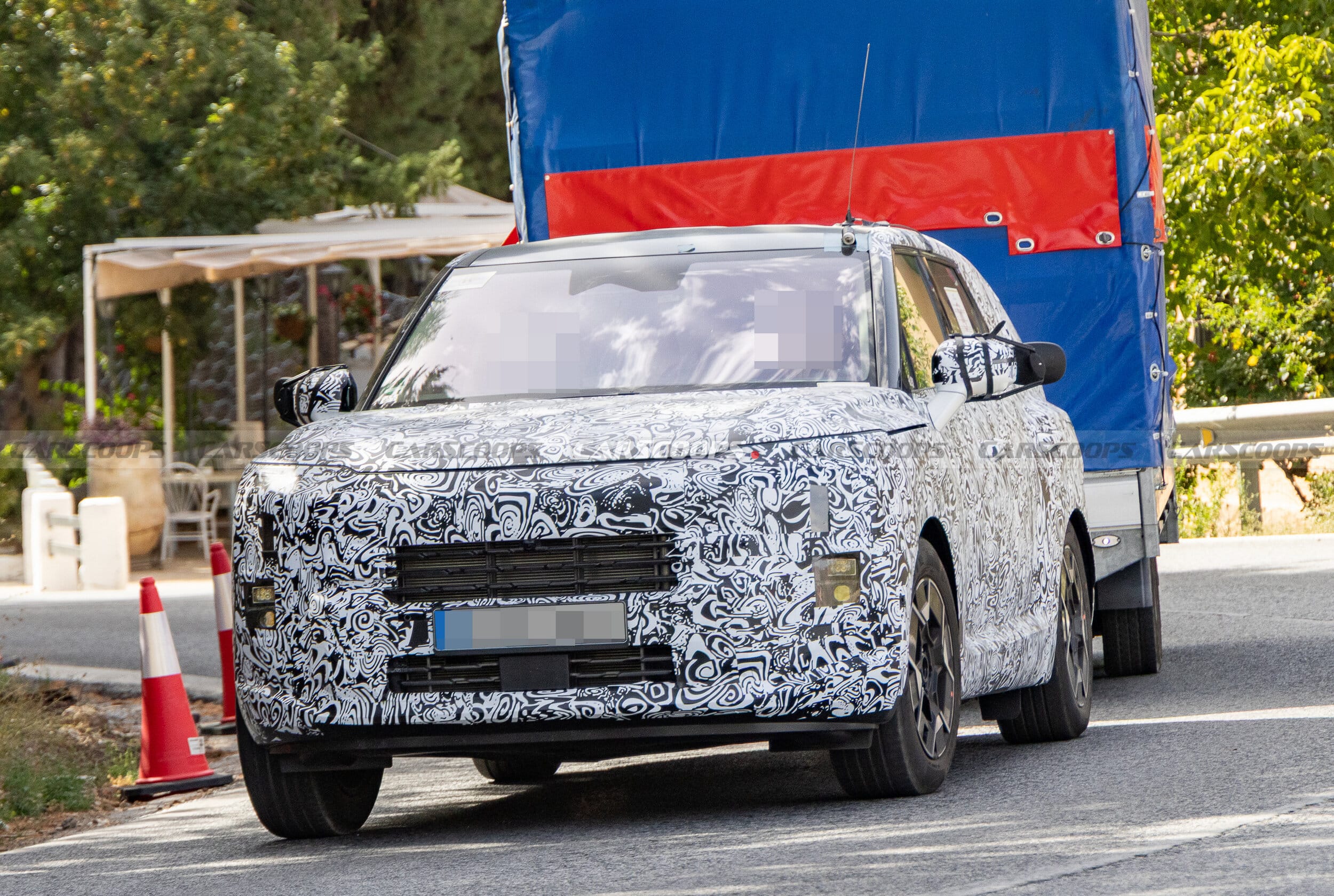 2028 kia sportage drops disguise and looks like a smaller telluride