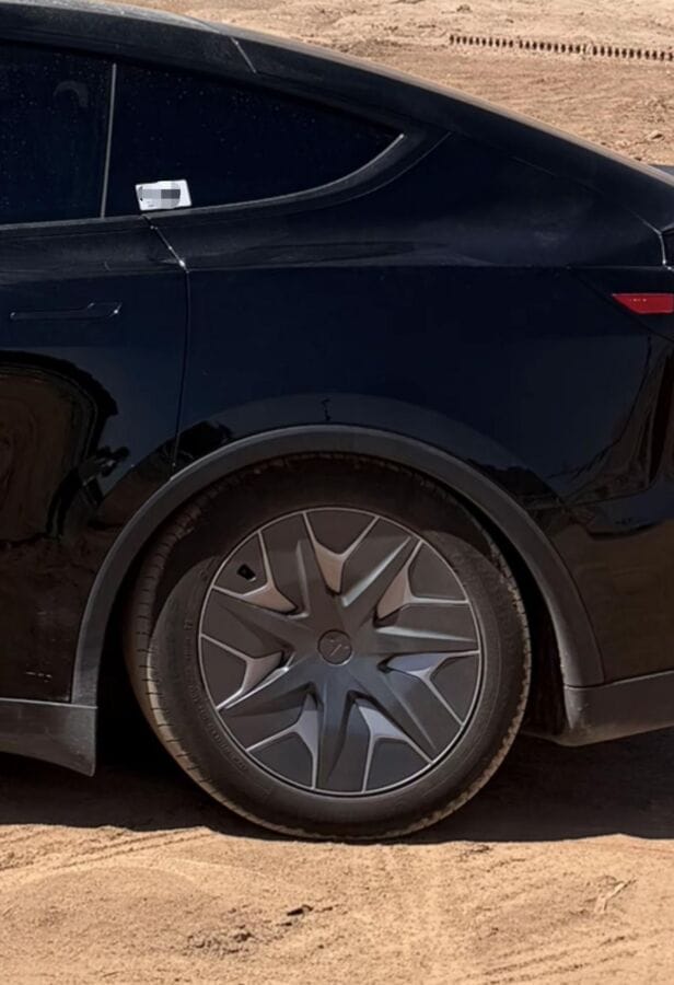 Tesla caught quietly altering model y l manual specs following rear suspension collapse reports