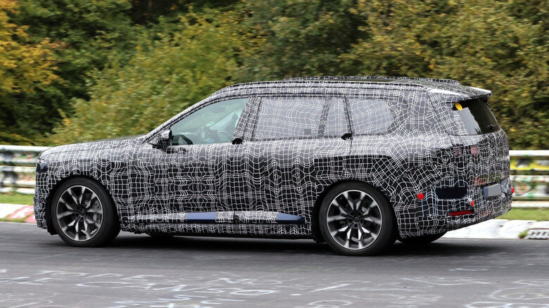 Bmw ix7 spied testing three rows of electric luxury as hotter x7 m60 tracks close behind