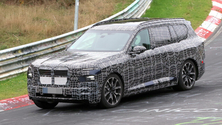 Bmw ix7 spied testing three rows of electric luxury as hotter x7 m60 tracks close behind