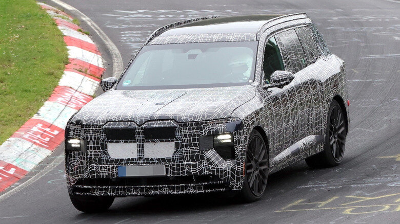 Bmw ix7 spied testing three rows of electric luxury as hotter x7 m60 tracks close behind
